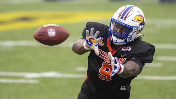 Feb 2, 2023; Mobile, AL, USA; National defensive lineman Lonnie Phelps Jr of Kansas (9) practices during the third day of Senior Bowl week at Hancock Whitney Stadium in Mobile. Mandatory Credit: Vasha Hunt-USA TODAY Sports